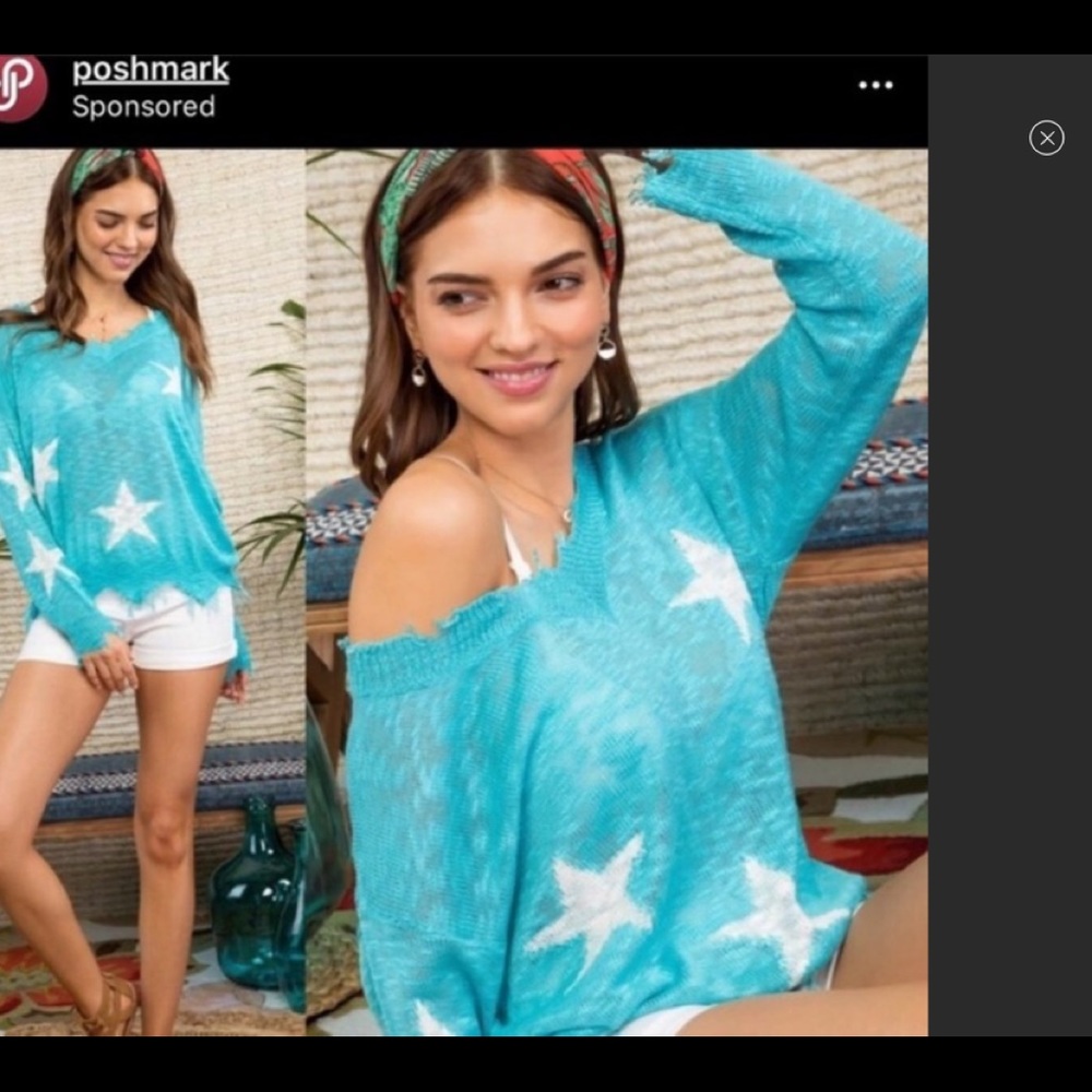 Raw edge star sweater